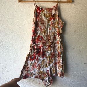 Romper with laced open sides